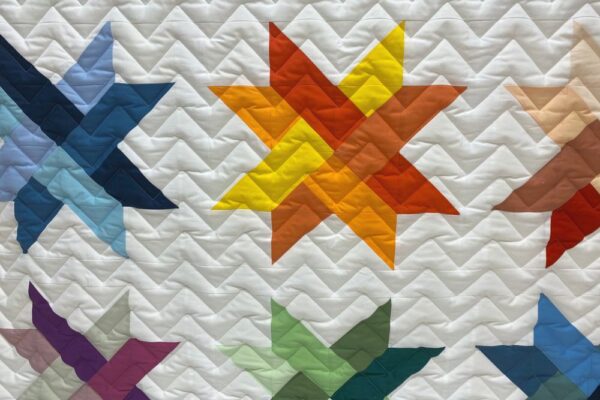 nahaufnahme bunte sterne zacken quilting